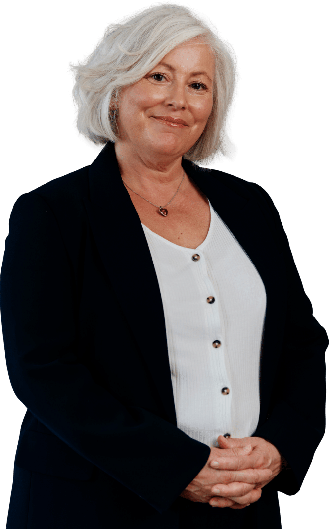 Elegant woman with silver hair in business attire.