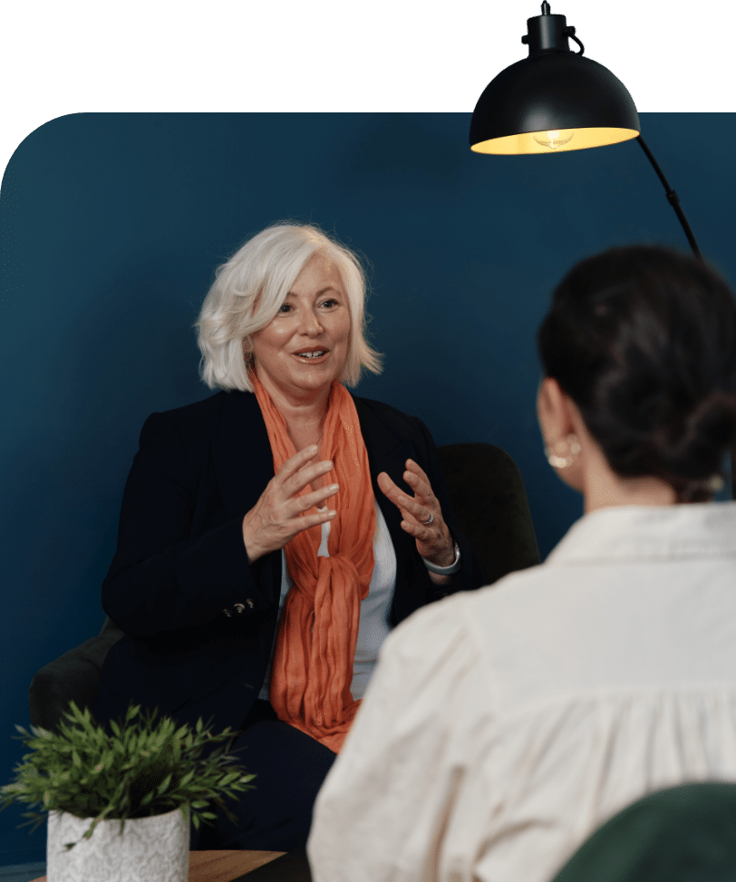 Woman having a conversation in modern office space.